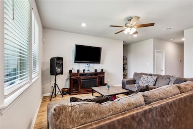 living room looks out into large backyard
