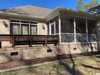 View of side of property featuring crawl space, a 
