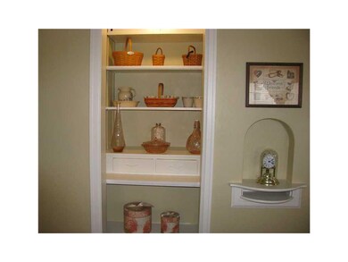 Living Room. Built in display shelves.