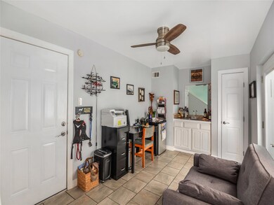Enter to bonus room which has a wet bar, door to g