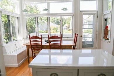Photo  Kitchen view to table & window