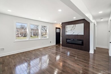Exquisitely crafted feature wall boasting an electric LED fireplace, enhancing both aesthetic appeal and functionality.