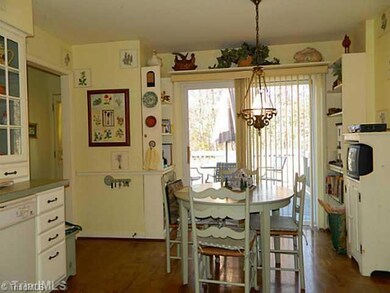Breakfast. Breakfast nook in kitchen looks out onto back deck and yard