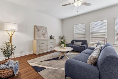 Living room with dark hardwood / wood-style floors