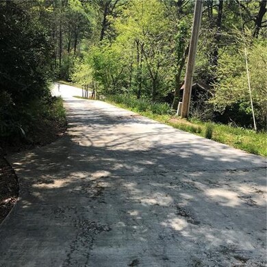 Cement paved accent to home