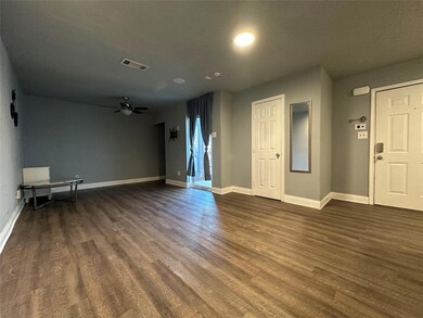 Unfurnished living room with visible vents, a ceil