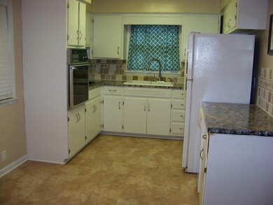Window over the sink is a nice feature for letting