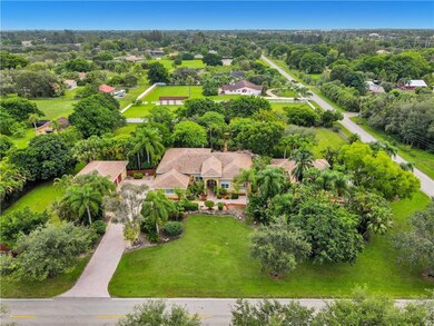 Situated on 2.3acre corner lot, with main house wi