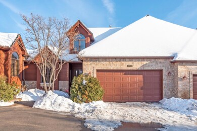 Attractive townhome - double garage for parking and storage.