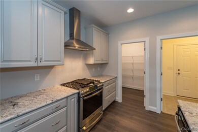 Photos are of a similar home in the community and
