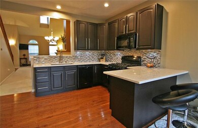 The stylish kitchen is a cook's delight!  Plenty o