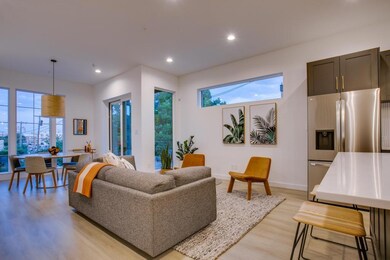 Living room with light wood-type flooring