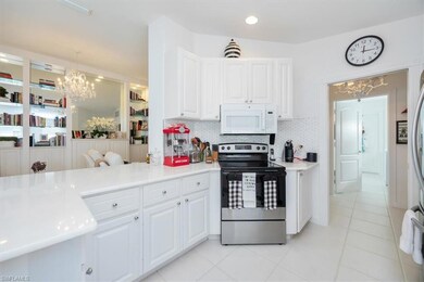 Kitchen with stainless steel range with electric s