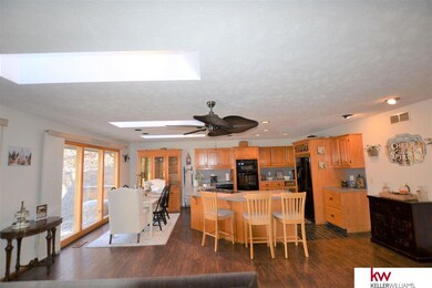 View of Kitchen from Great Room. Open to Great room and dining area.