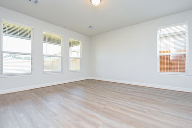 Living room windows overlooking the large patio an
