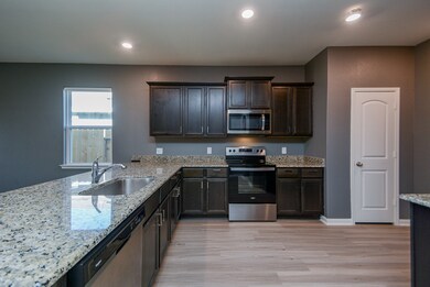 Plenty of cabinets in this kitchen.