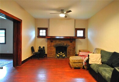 Wood burning brick fireplace. Huge original pocket