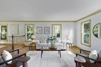 Step down in to the large beautiful living room.