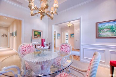 The dining room is accessible from the foyer as we