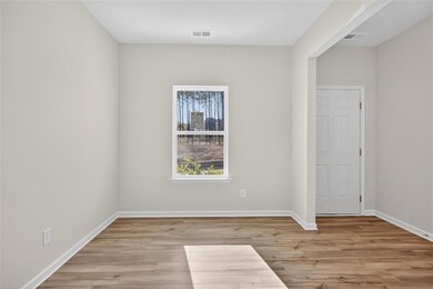 Empty room featuring light wood-type flooring