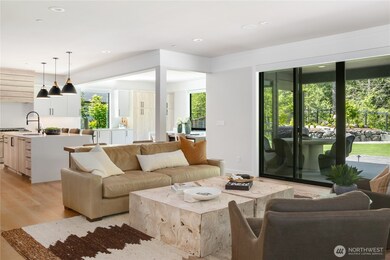 The family/bonus room welcomes you to sit, stay & view the beautiful grounds. Black gorgeous windows