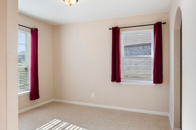 Formal dining or office space right off front door.