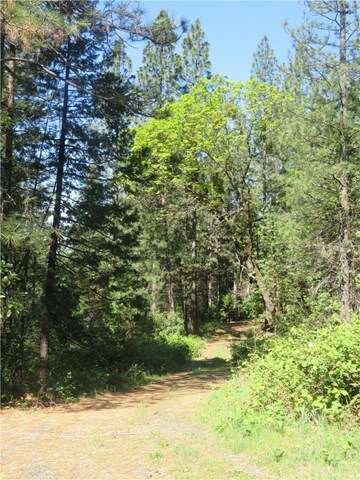 gravel access road from Provenza Dr. to property