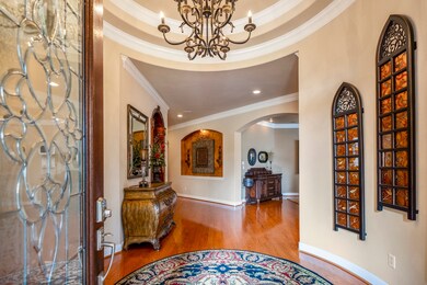 Wood surround lead glass front door invites you in