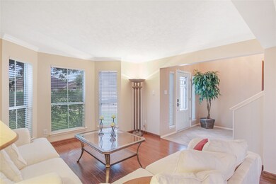 Formal Living Room with a Bow Window View
