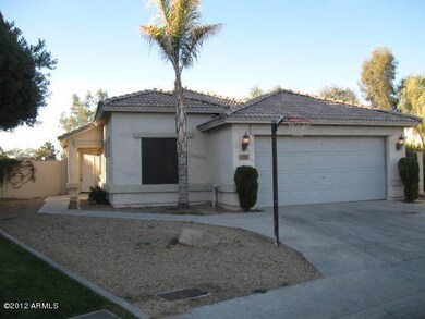 Front door to left of garage