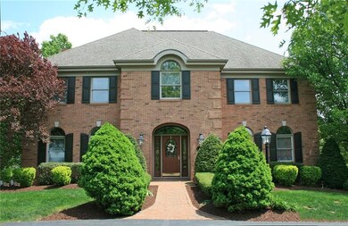 A level walkway and covered entry greet your guest