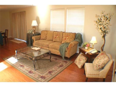 Living Room. The Hardwood Floors Flow into the Ope
