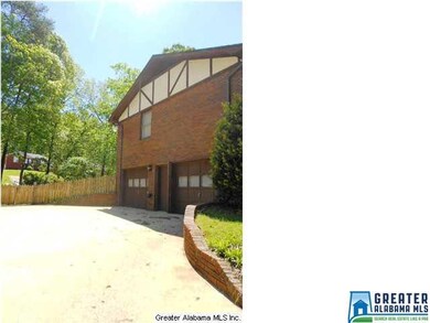 The driveway showing the 2-car garage
