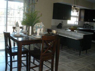 eat in kitchen with sliding door