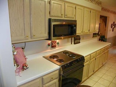 New microwave in 2010 ... drop-in GE range ... pan