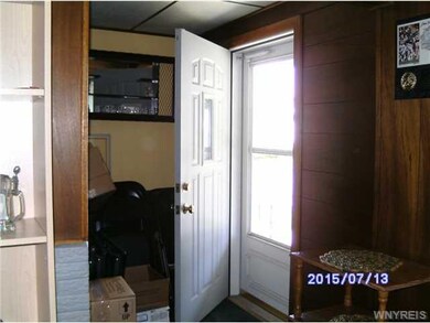 Foyer. Front entranceway, off the open front porch