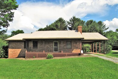 Brick ranch with carport
