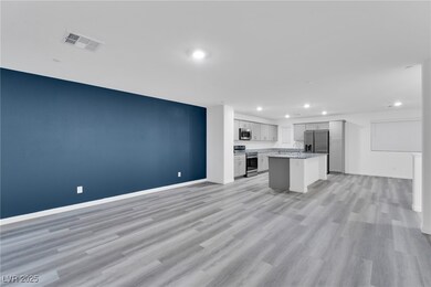 Kitchen with appliances with stainless steel finis