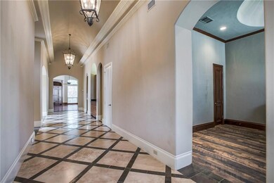 Home office located off entry hall provides privac
