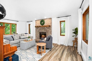 Living room with hardwood / wood-style flooring, b