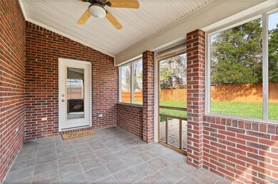 Screened in porch on back of home