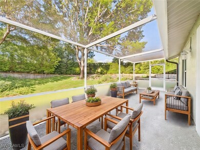 Expansive Screened Lanai w View of Private Rear Ya