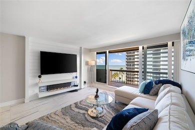 Tiled living room featuring a fireplace