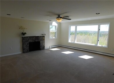 The stone fireplace mantel in the...