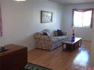 A view of the living room from the dining area.  T