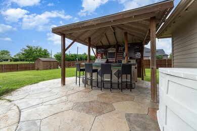 Living room with ceiling fan, light hardwood / wood-style flooring, vaulted ceiling, and crown molding