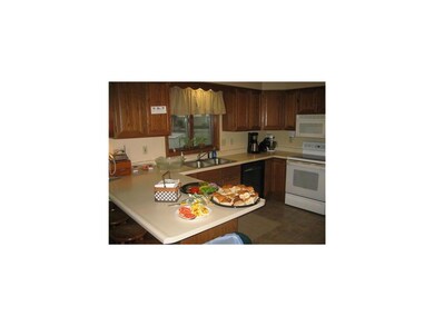 Kitchen. This open kitchen has LOTS of cupboard an