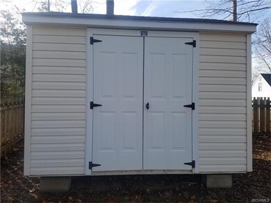 Detached storage shed in rear yard
