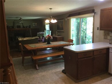 Open concept kitchen, dining, and living rooms. Pe