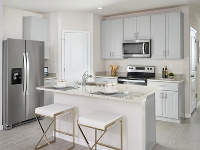 Photo is not of the actual home, but is an inspirational photo of builder’s model home and may depict options, furnishings, and/or decorator features that are not included